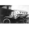 Kingsland Coffyn (right) and an unidentified child in an automobile, possibly a Locomobile.