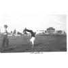 Frank Coffyn watching Ralph Johnstone doing a handstand.
