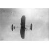 Walter Brookins flying a Wright transitional aircraft.