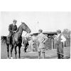 Frank Coffyn on horseback, speaking to Ralph Johnstone and Duval La Chapelle.