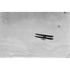 Wright Model B in flight, wings warped.
