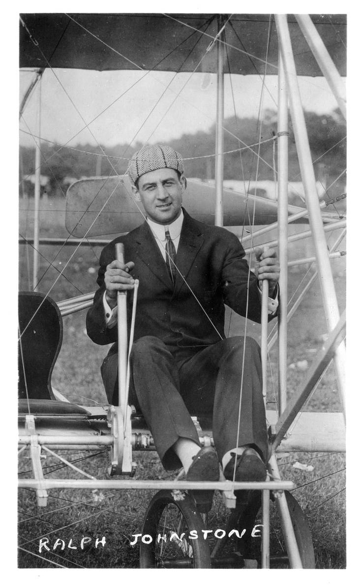Ralph Johnstone at the controls of an early Wright Model B.