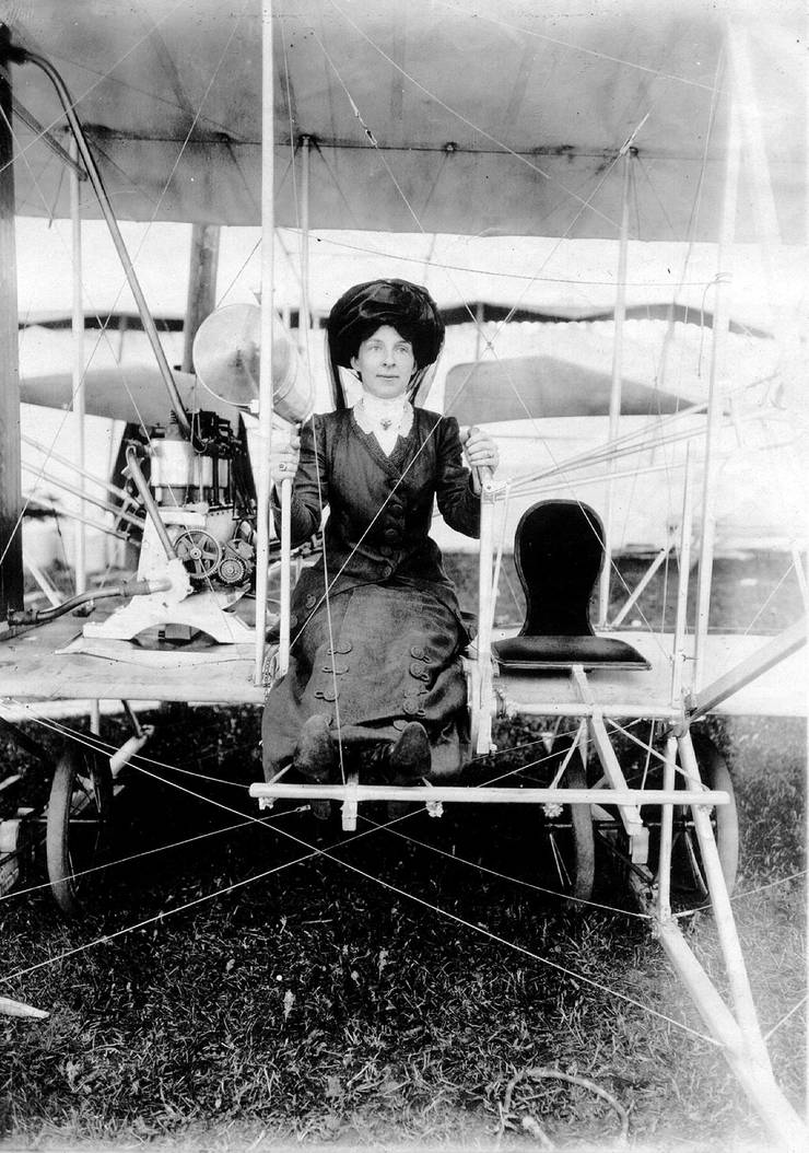 Mrs. Frank Coffyn posing in an early Wright Model B.