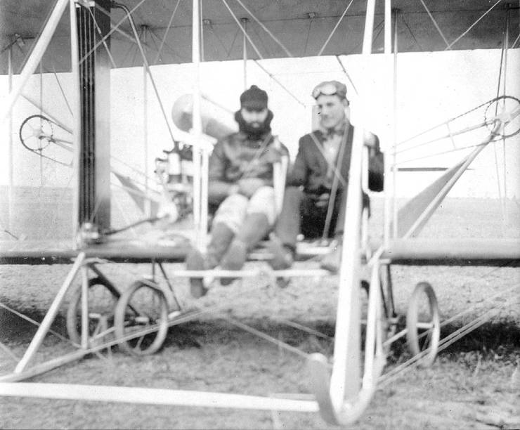 Frank Coffyn and passenger aboard Wright Model B.