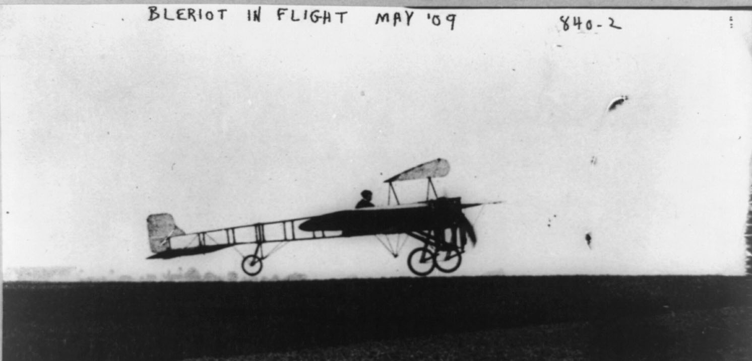 The flying wires can be seen in this photo of Bl�riot in flight in May 1909.

