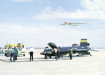 X-15 on lakebed with B-25 mothership flyover