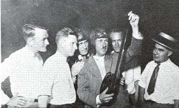 Airmail personnel look at film of Air Mail