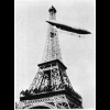 Dumont flies his airship around the Eiffel Tower