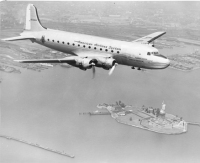 Commercial airliner over New York Harbor.